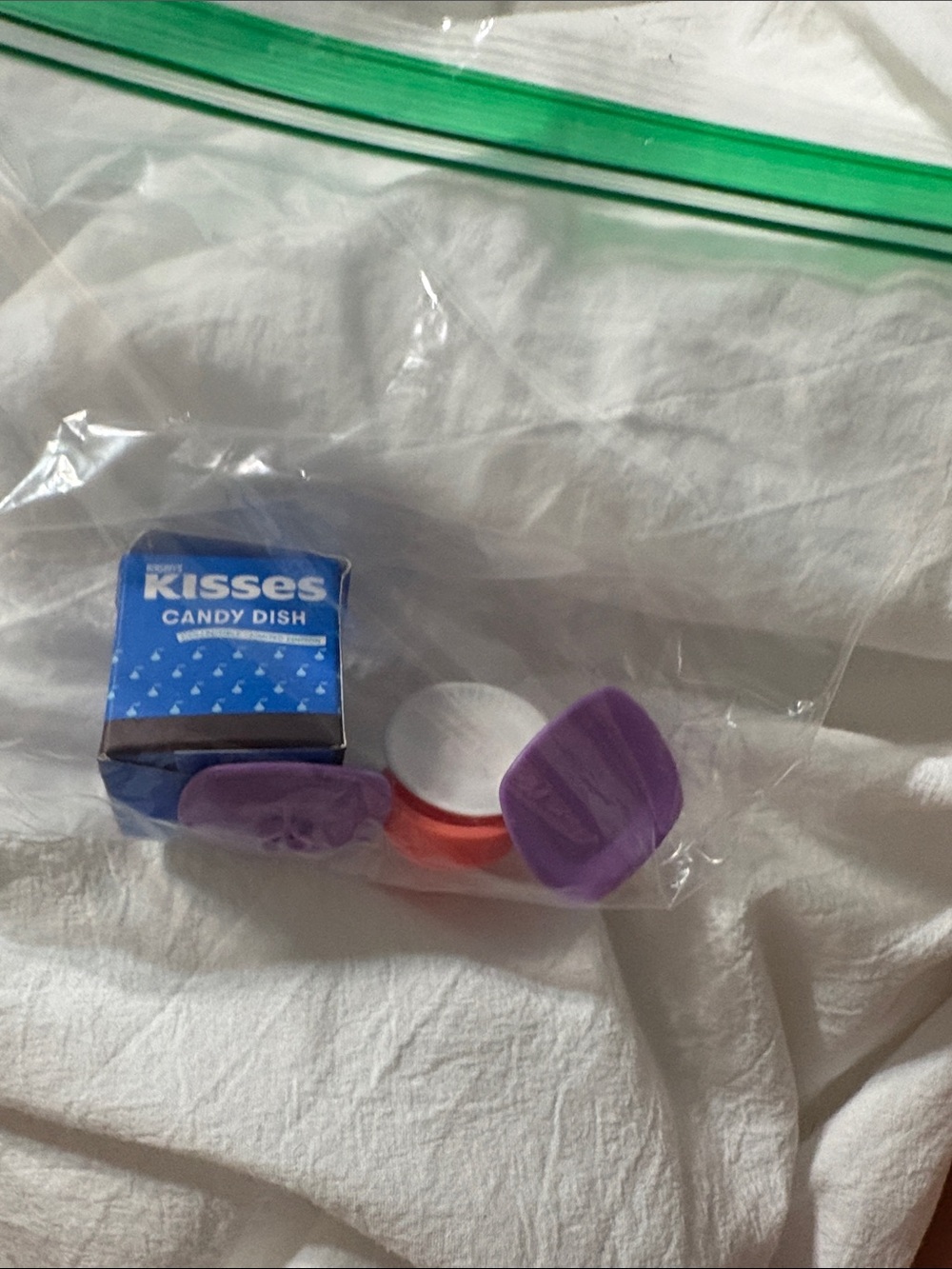 KISSES Candy Dish with Purple Lens Caps